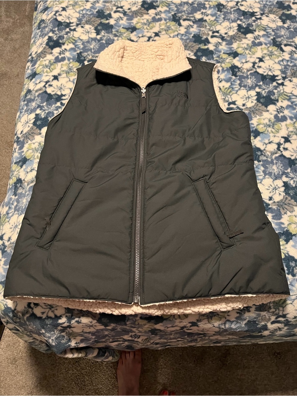 The North Face Reversible Sherpa-Lined Vest in Black and Cream